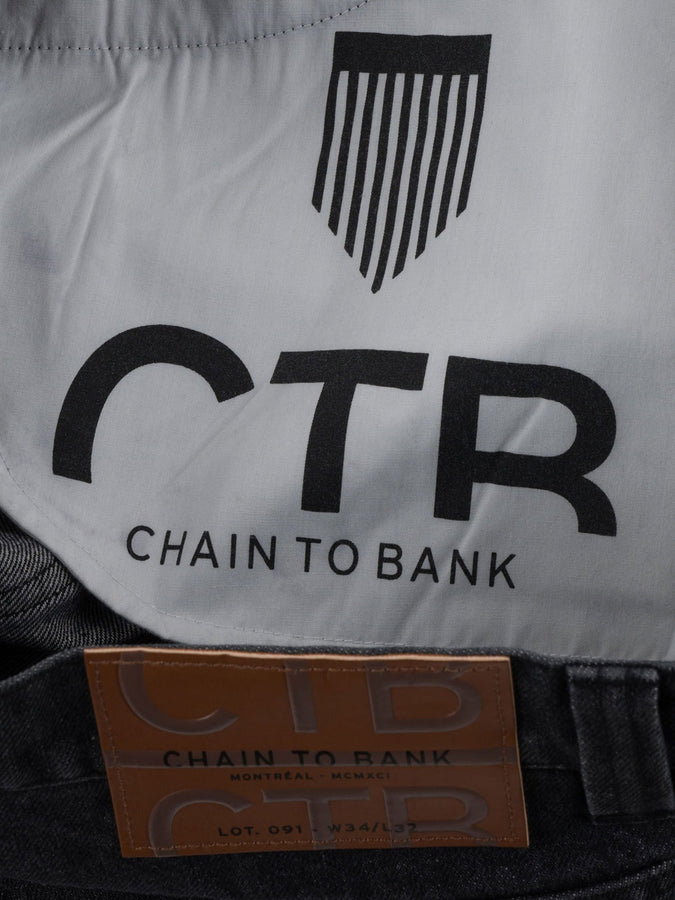 Chain To Bank Thousands Standard Distressed Jeans Fall 2027 | DISTRESSED BLACK WASH