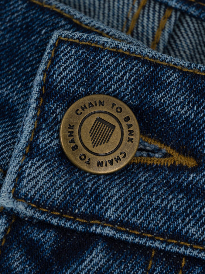 Chain To Bank Thousands Standard Distressed Jeans Fall 2027 | DISTRESSED INDIGO WASH