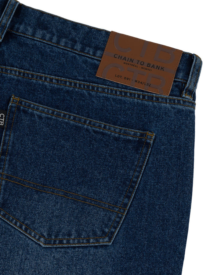 Chain To Bank Thousands Standard Distressed Jeans Fall 2027 | DISTRESSED INDIGO WASH