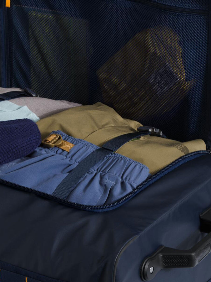 TNF Base Camp Voyager 29 Roller Suitcase Spring 2026 | SUMMIT NAVY/SMT GLD (H7I)