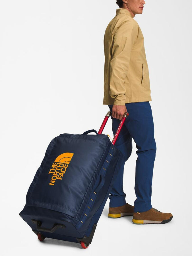 TNF Base Camp Voyager 29 Roller Suitcase Spring 2026 | SUMMIT NAVY/SMT GLD (H7I)
