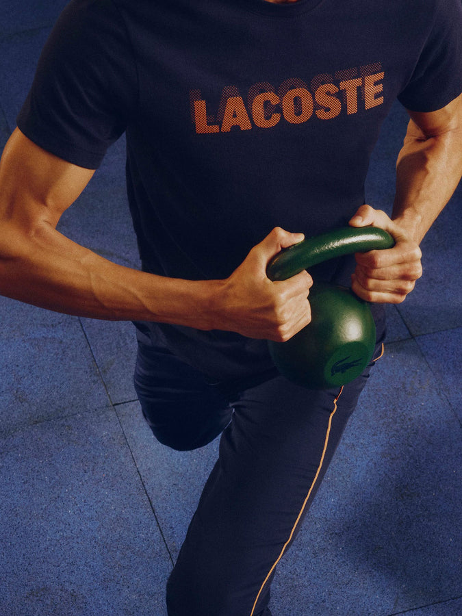 Lacoste Ultra Dry Graphic Print Sport T-Shirt Spring 2026 | NAVY/ORANGE (4IB)