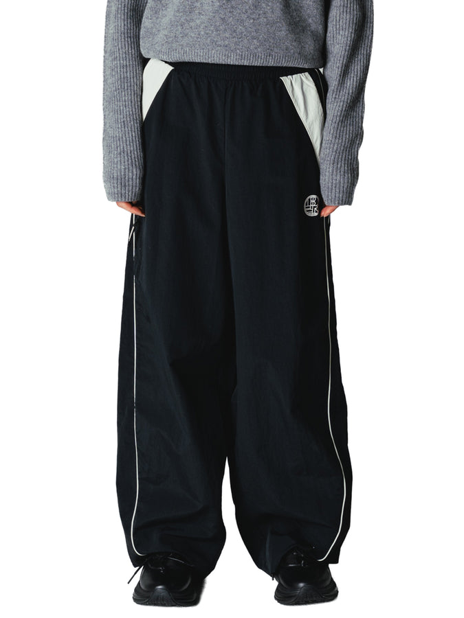 Woodbird Poke Sport Pants Fall 2026 | BLACK/OFF WHITE