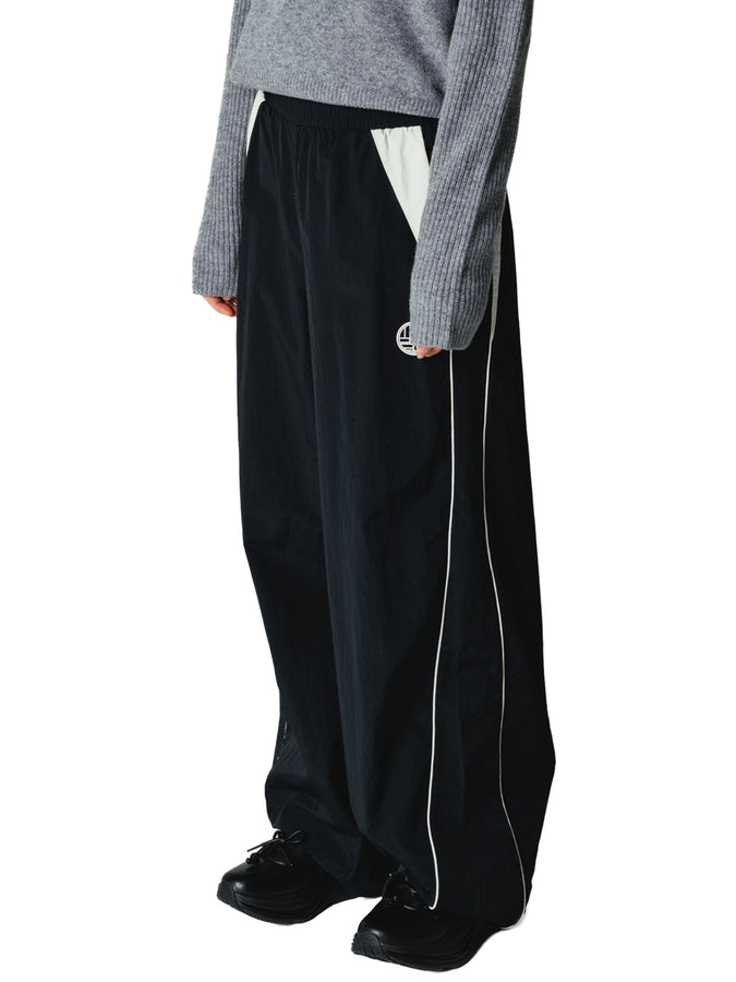 Woodbird Poke Sport Pants Fall 2026 | BLACK/OFF WHITE
