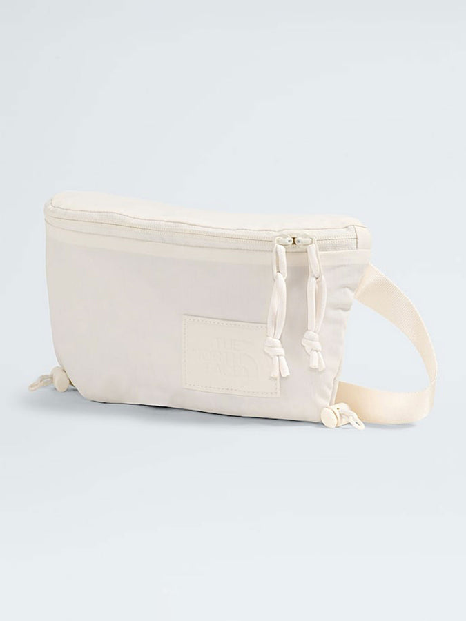 The North Face Never Stop Lumbar Bag Spring 2026 | WHITE DUNE (QLI)